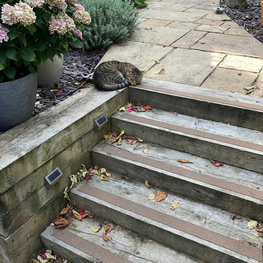 GRP anti-slip decking strips on their garden patio steps