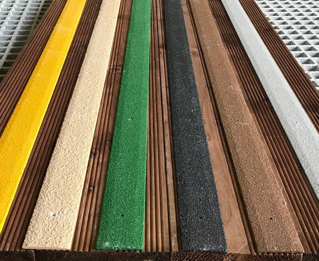 GRP anti-slip decking strips fixed to wet wooden garden decking