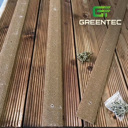 Brown pre-drilled anti-slip decking strips and screws on timber decking